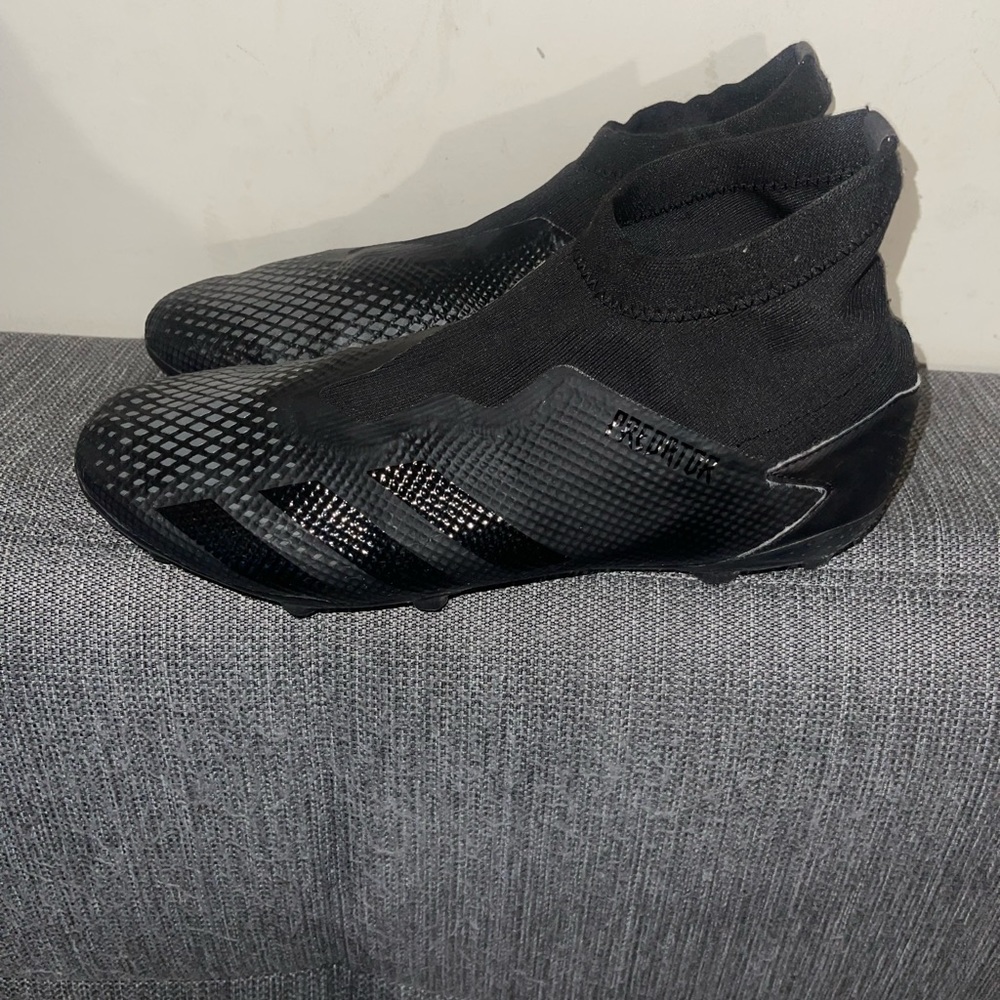 Men football cleats~adida size 11.5. No box and in mint condition.